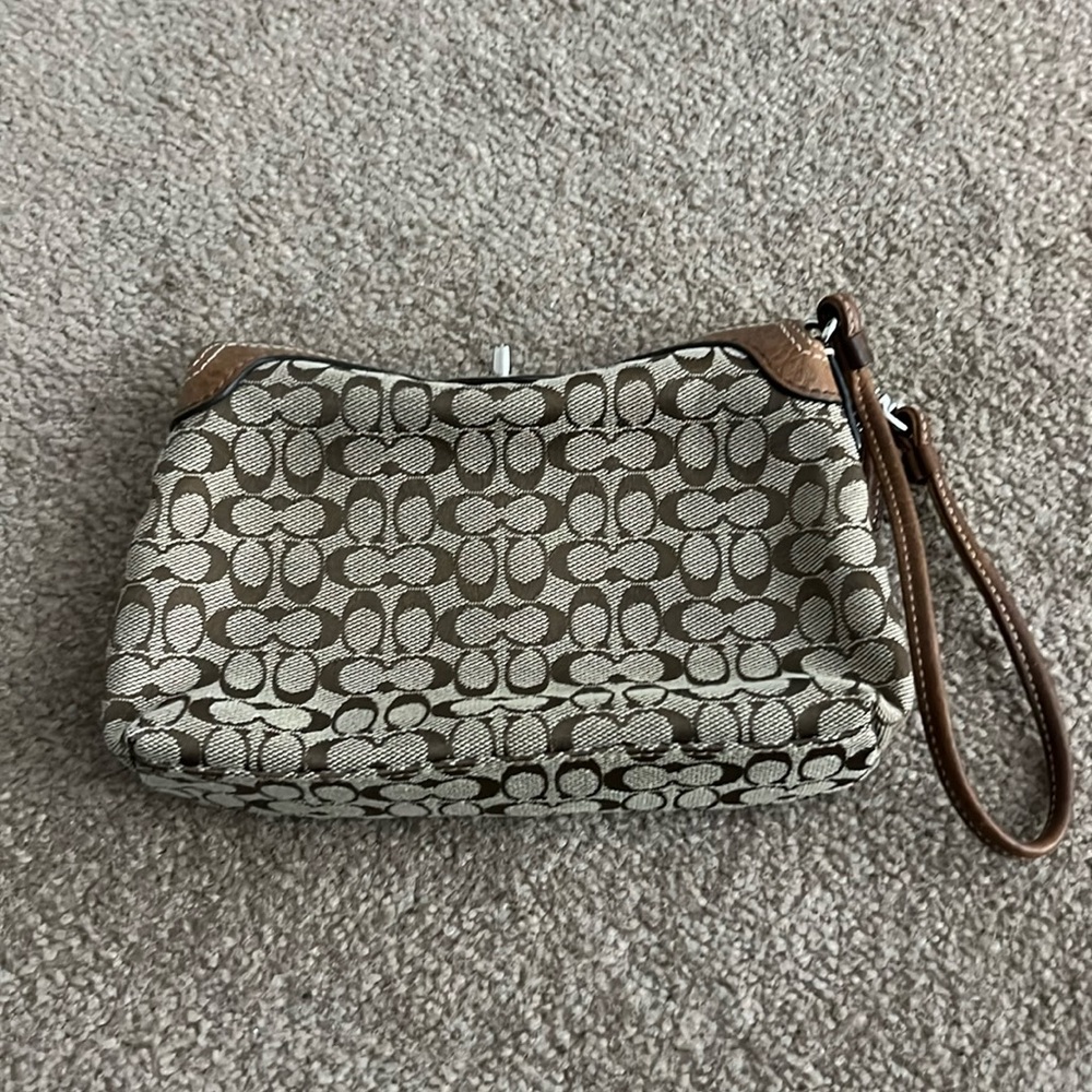 dark coach wrist bag